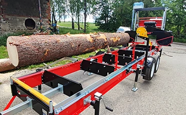 Trak taśmowy OPTIMAT Timberland TMG 910 podczas pracy